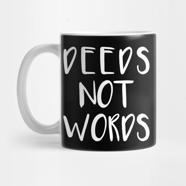 DEEDS NOT WORDS feminist text slogan by MacPean